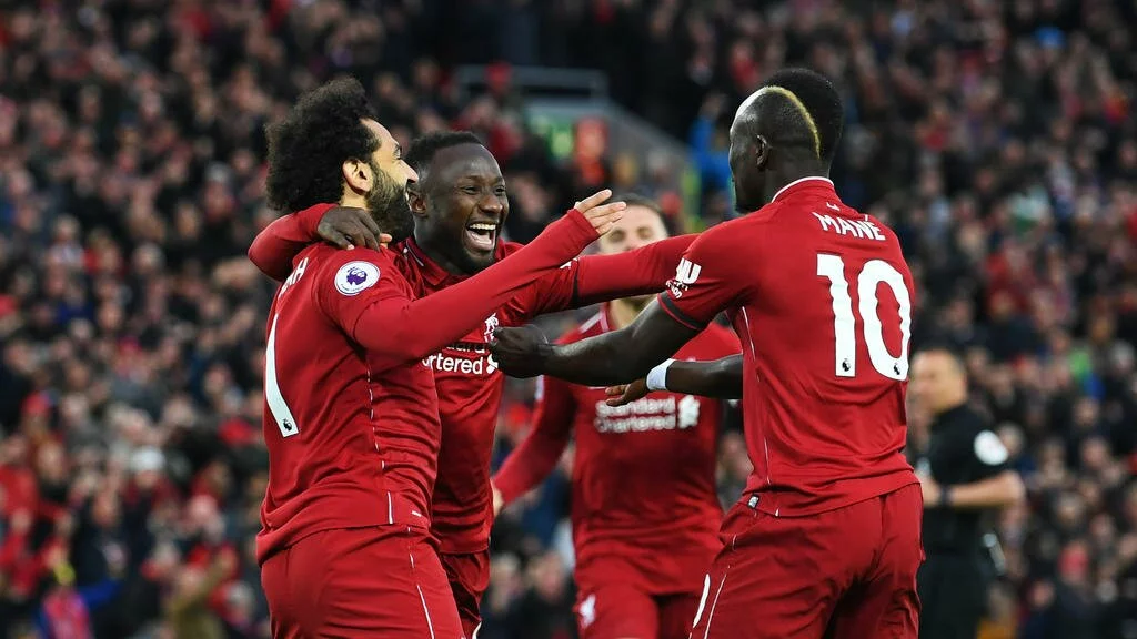Five-goal Liverpool crush Huddersfield to regain top spot - FootyNews.co.uk